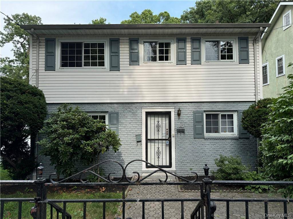 Beautifully renovated 2nd floor apartment on a quiet dead end tree lined street, one block from the Pelham border.