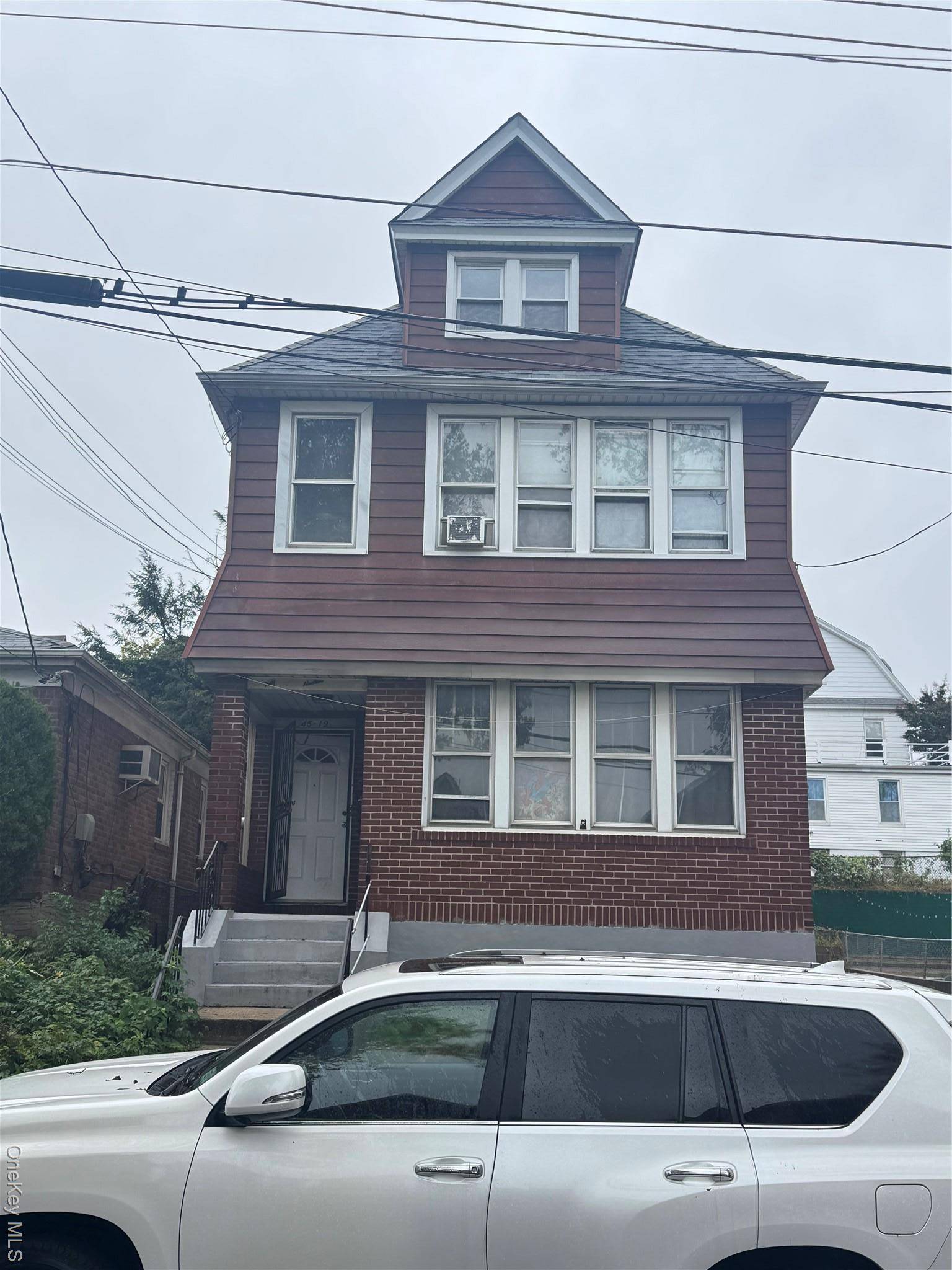 Welcome to this beautiful 2 family home in Flushing.