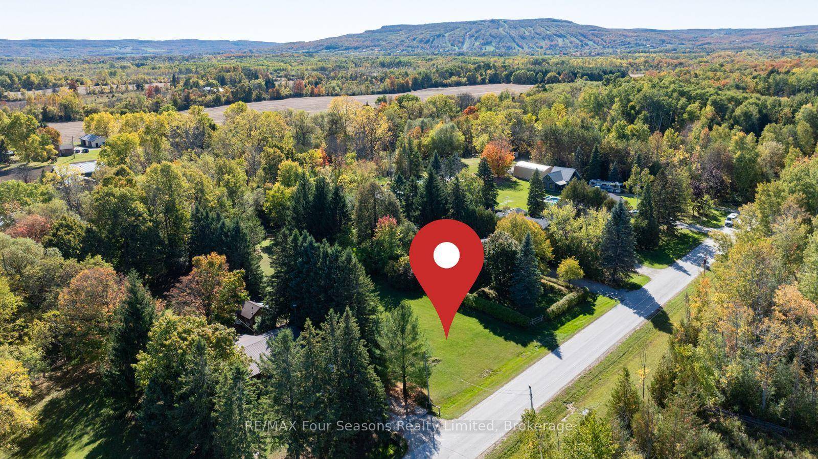 Welcome to 5 Caddo Drive, a rare opportunity to own a spacious 0.