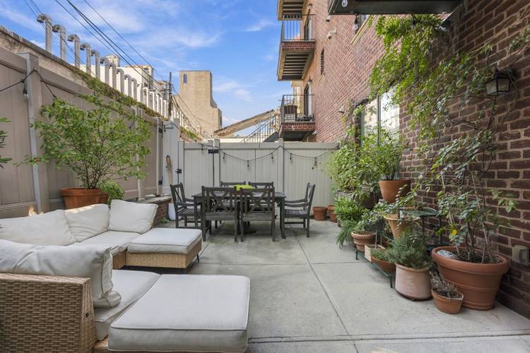 Welcome to your Prime Williamsburg home with a Private Backyard !
