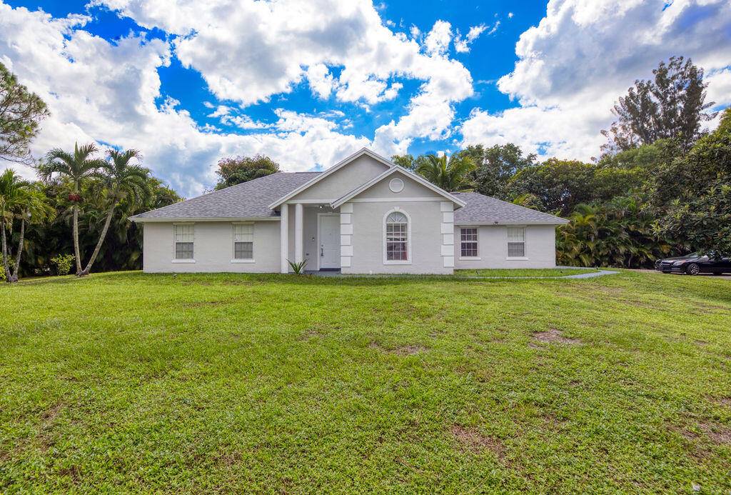 Welcome to this beautiful acreage retreat set on 1.