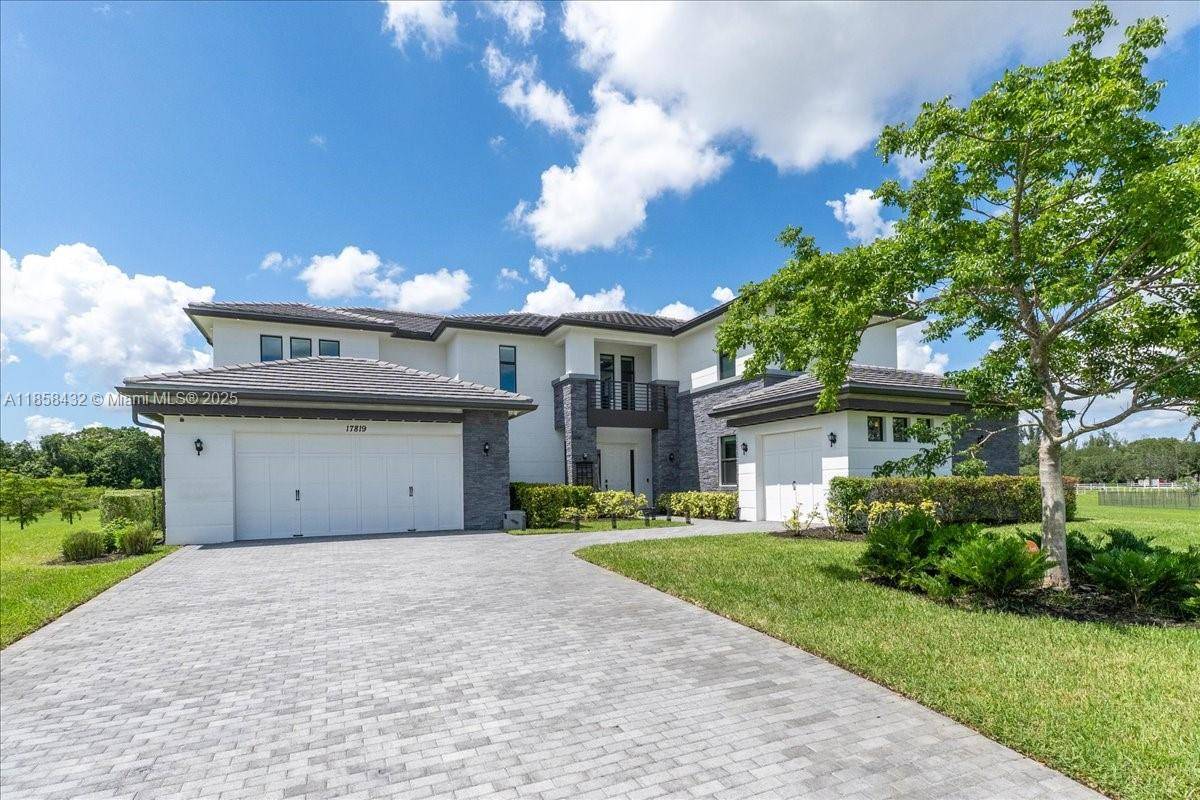 Stunning 2019 built estate in coveted Rolling Oaks, Southwest Ranches.