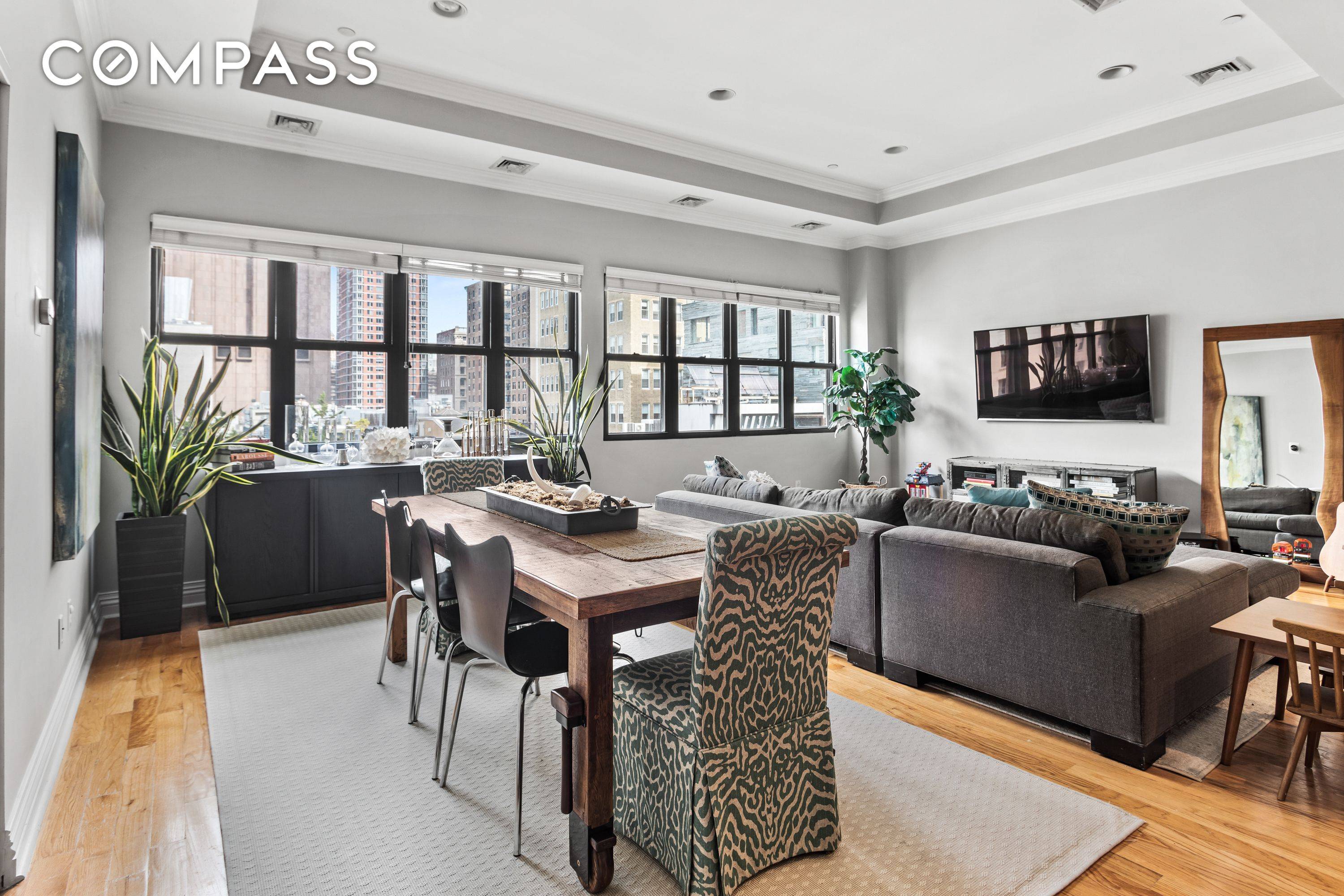 This gorgeous Two Bedroom 2 Bathroom Loft Condo in Tribeca has it all !