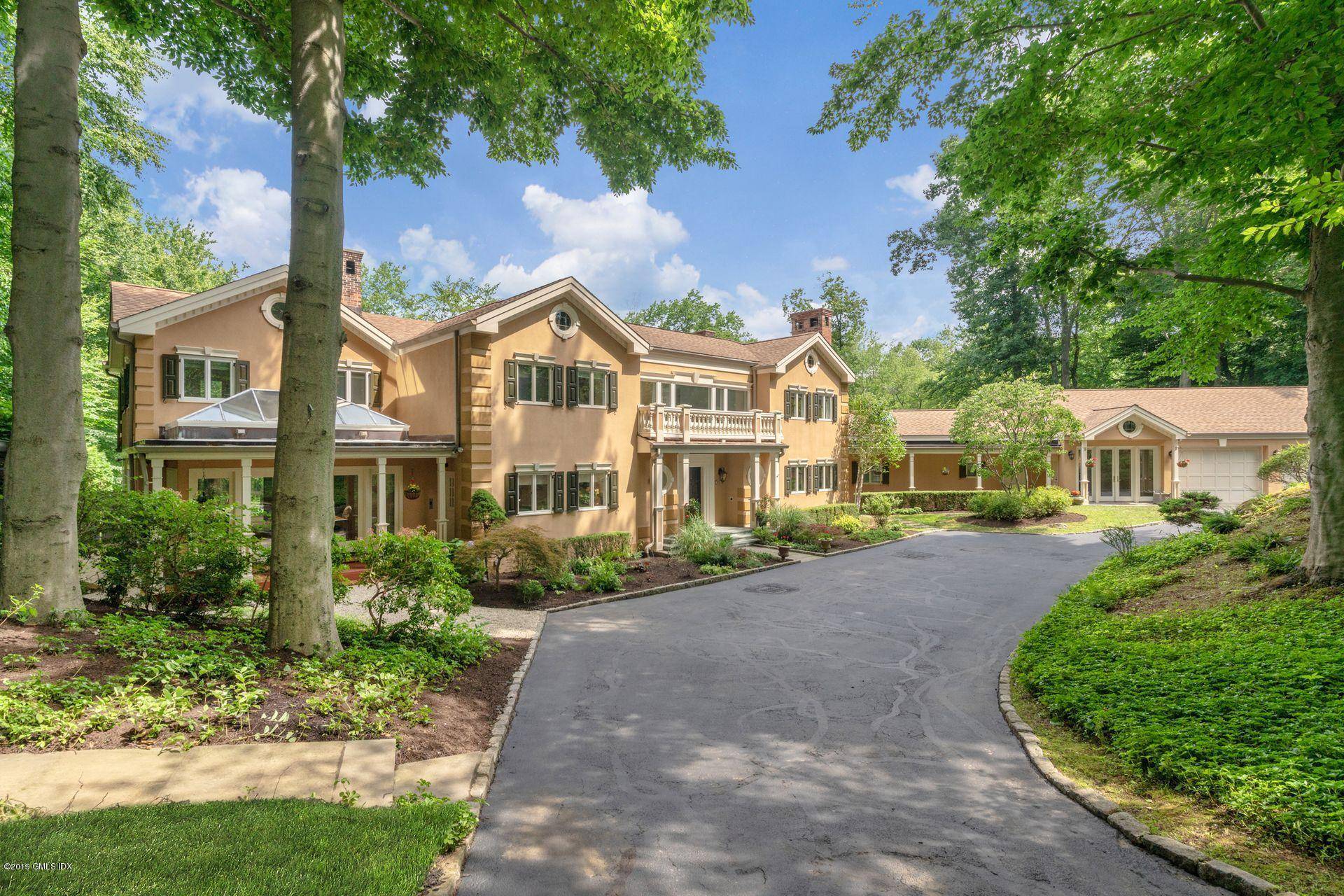 Just Off North Street Beautifully updated custom home on two private acres abutting conservation land has wine tasting terrace, arbor and a tranquil 36' x 18' pool with diving rock, ...