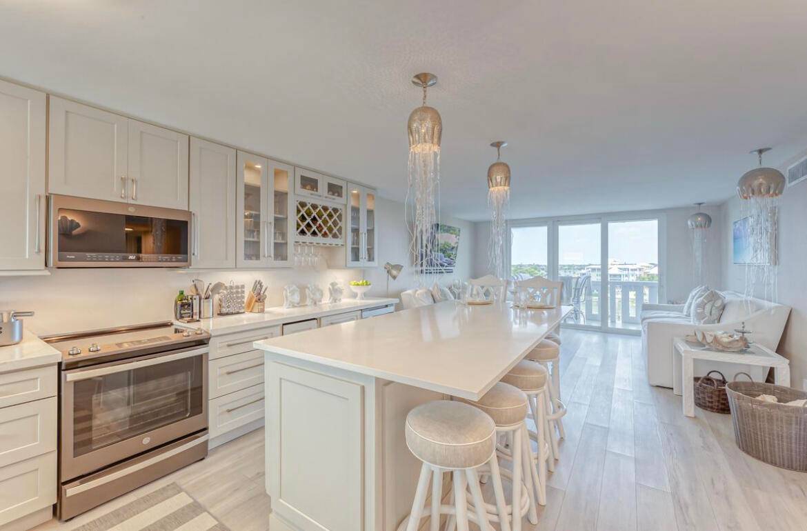 Experience Florida in this exquisitely designed and tastefully renovated 2 bed 2 bath condo with panoramic views of the Intracoastal water way and the Atlantic Ocean horizon.