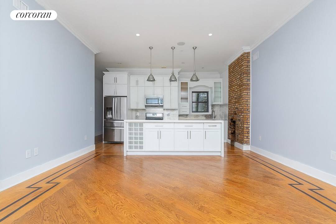 Welcome to 38 Grove Street, a FULLY LEASED, income producing two family townhouse located on a quiet residential block in the heart of Bushwick.