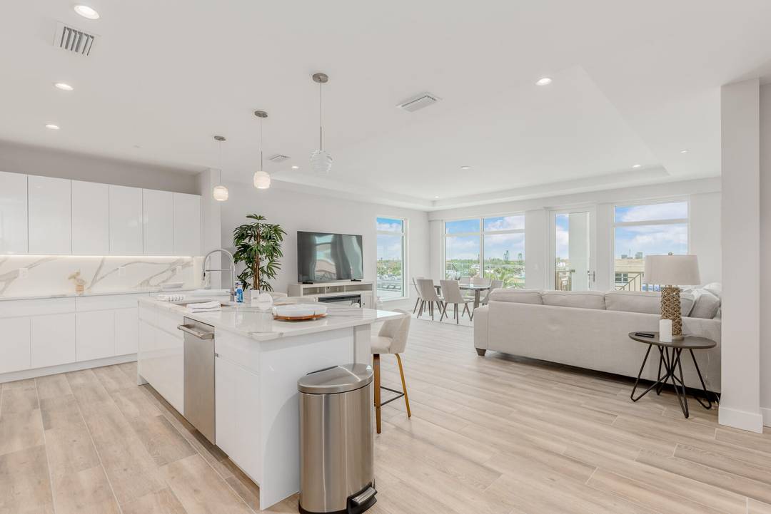 Experience Florida living at its finest in this stunning, fully furnished top floor corner unit in the exclusive Sailfish Cove riverfront community, located in the heart of Stuart, FL.