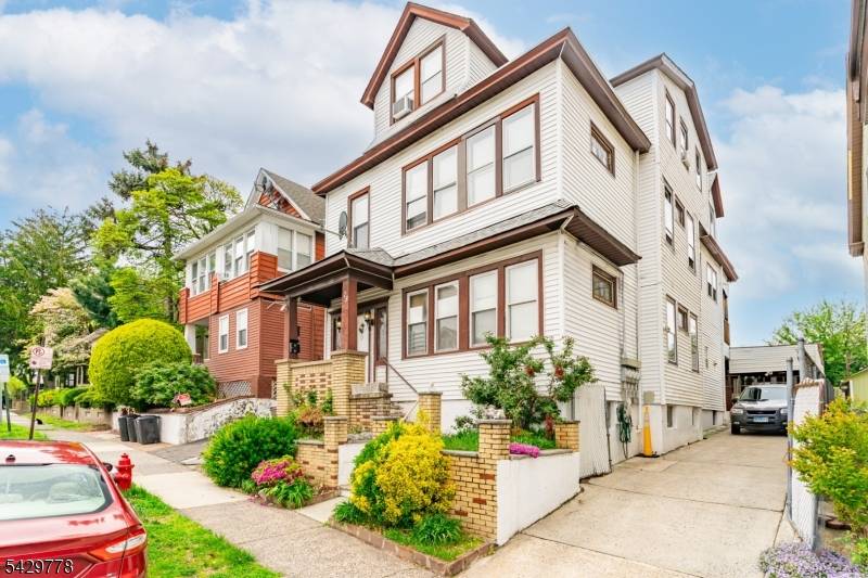 Massive 3 family property in South Paterson offering incredible space, versatility, and value.