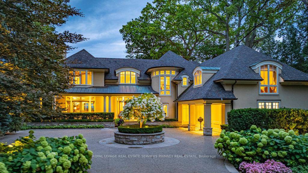 Gracefully set along the shores of Lake Ontario, this exceptional custom estate designed by Gren Weis occupies a prestigious waterfront property with coveted riparian rights in one of South East ...