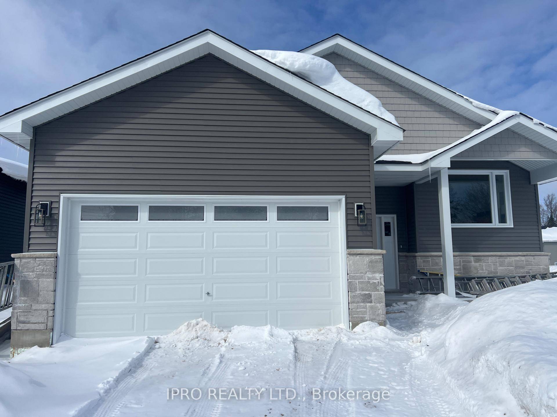 Beautifully Built Bright Brand New Raised Bungalow on a quiet rural lot in Proton Station.