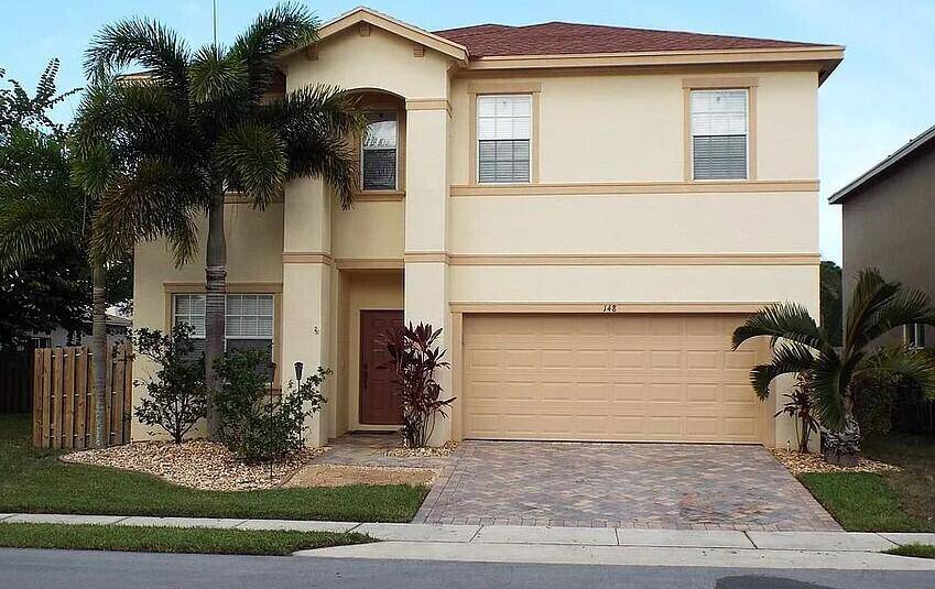 This inviting two story home offers an abundance of space and charm, featuring a bright kitchen complete with a cozy breakfast nook that's perfect for enjoying morning coffee.