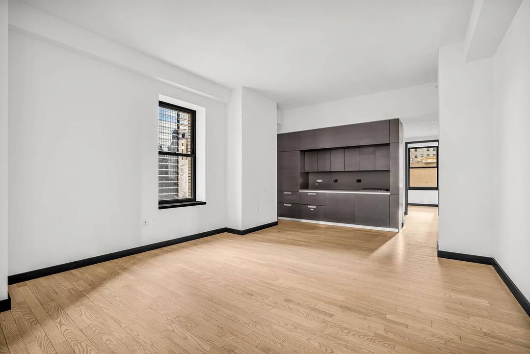 Welcome to this stunning 2 bedroom, 2 bathroom condo perched on the 29th floor of 20 Pine St.