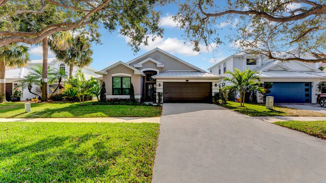 Welcome to 535 Enfield Court in Delray Lakes, the only gated community east of I 95 in Delray Beach.