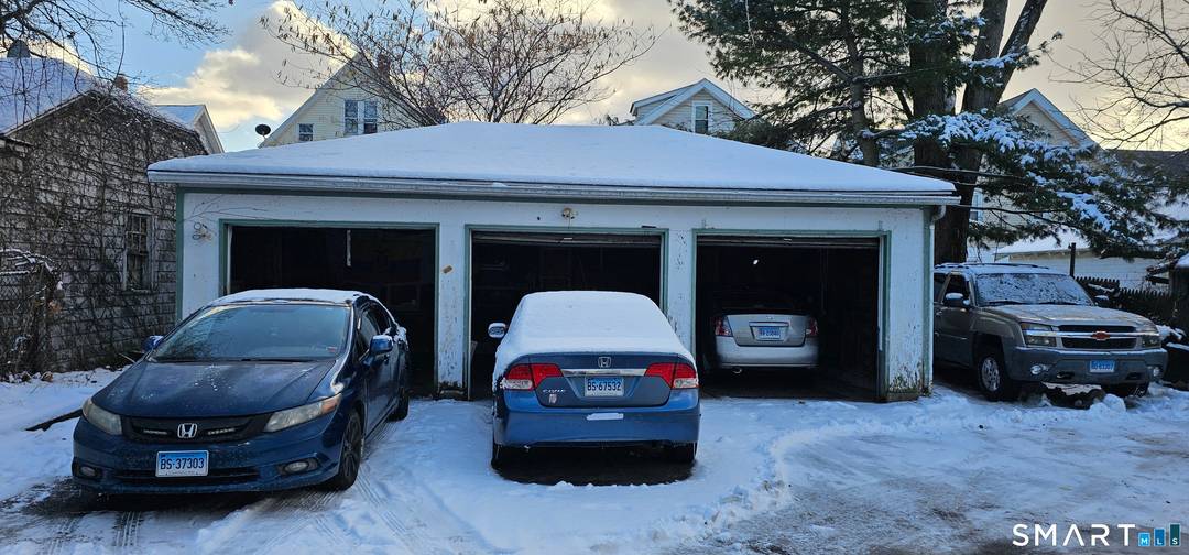 Well maintained three family home ideally located near Martha Hart Park.