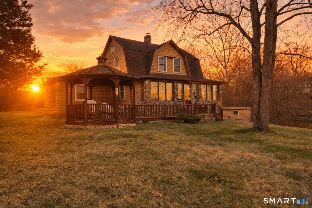 A rare opportunity to enjoy sweeping views of the Niantic River with over 17 acres of meadow and woods.