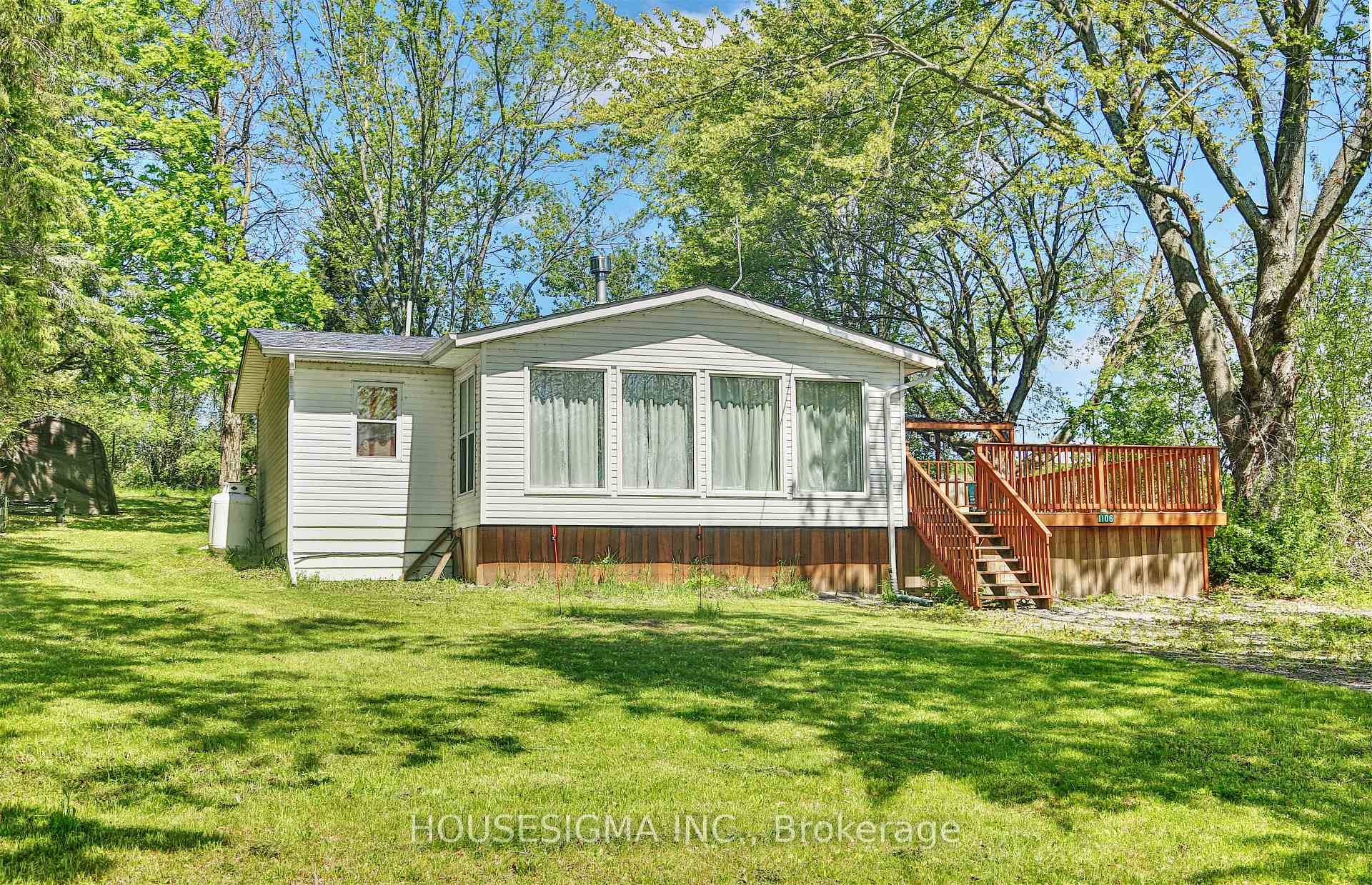 Welcome to this well maintained and affordable 3 bedroom, 1 bathroom cottage nestled in a peaceful and picturesque lakeside community.