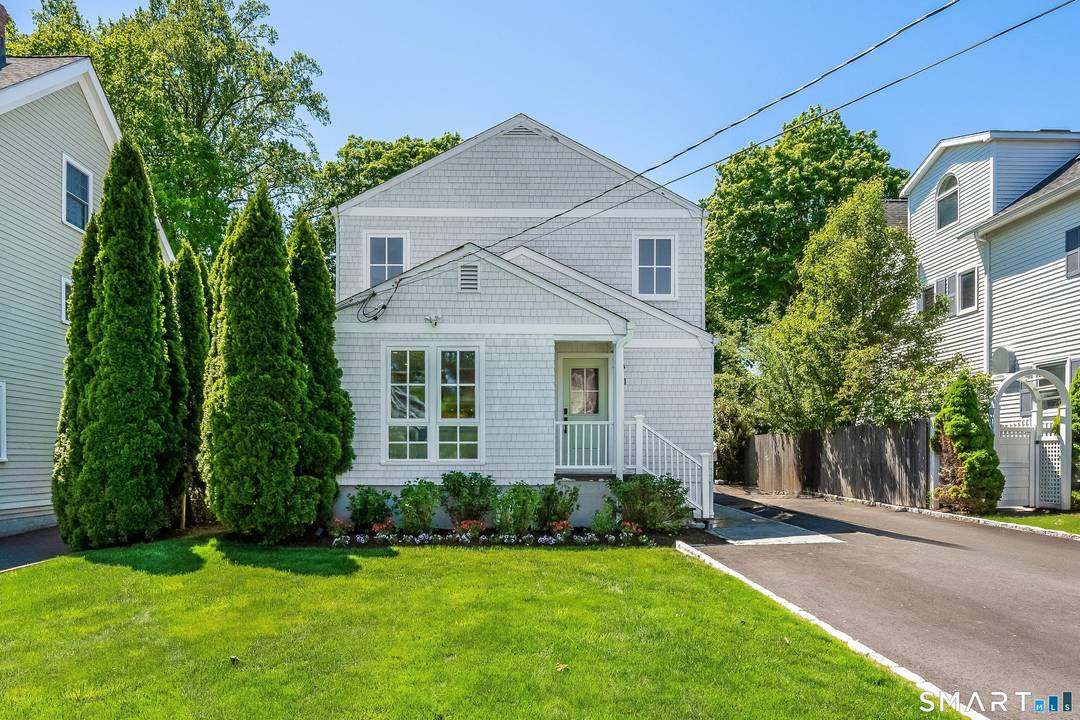 Step into timeless charm at 21 Fairfield Ave, Darien, where classic farmhouse colonial design meets modern luxury.