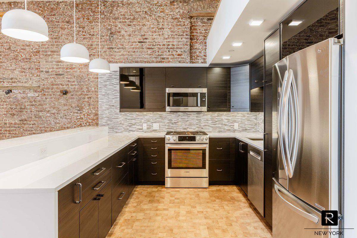 Exceptional gut renovated Loft configured as a one bedroom, one and half bathroom apartment with an additional 275 sf of mezzanine space.