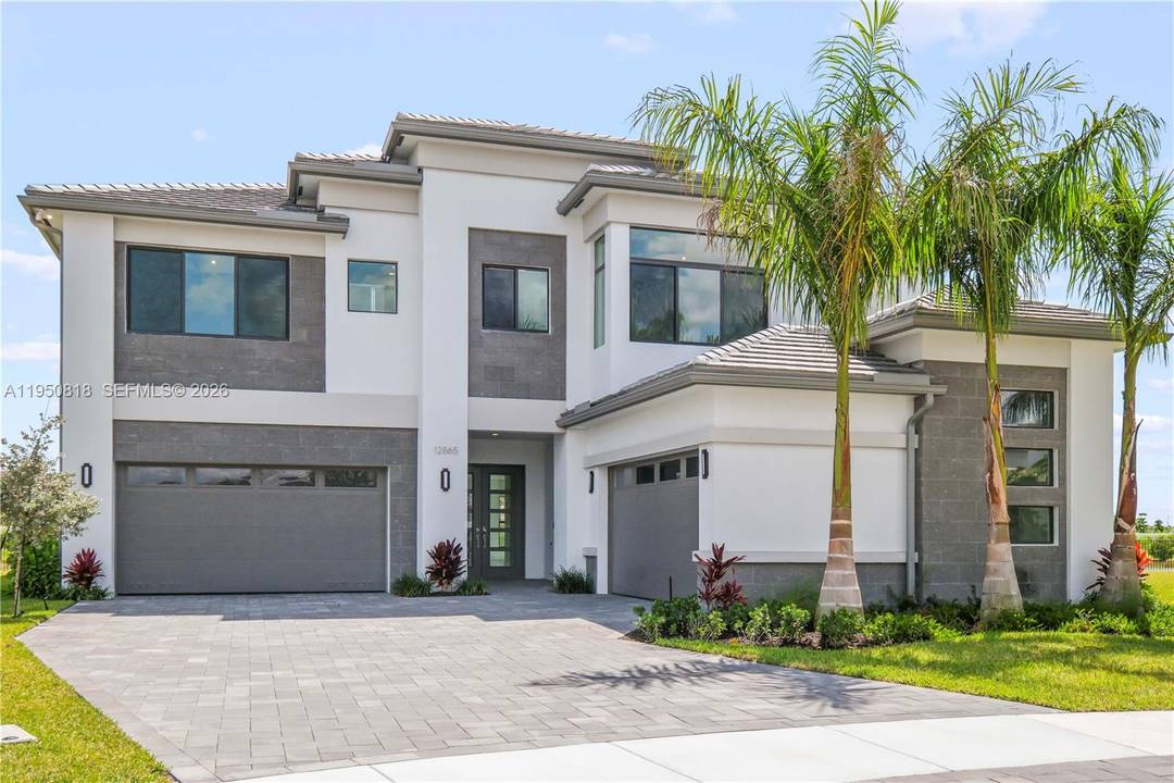 Experience luxury living at its finest in this exceptional estate set on a rare, oversized pie shaped lakefront lot offering unmatched privacy and breathtaking views.