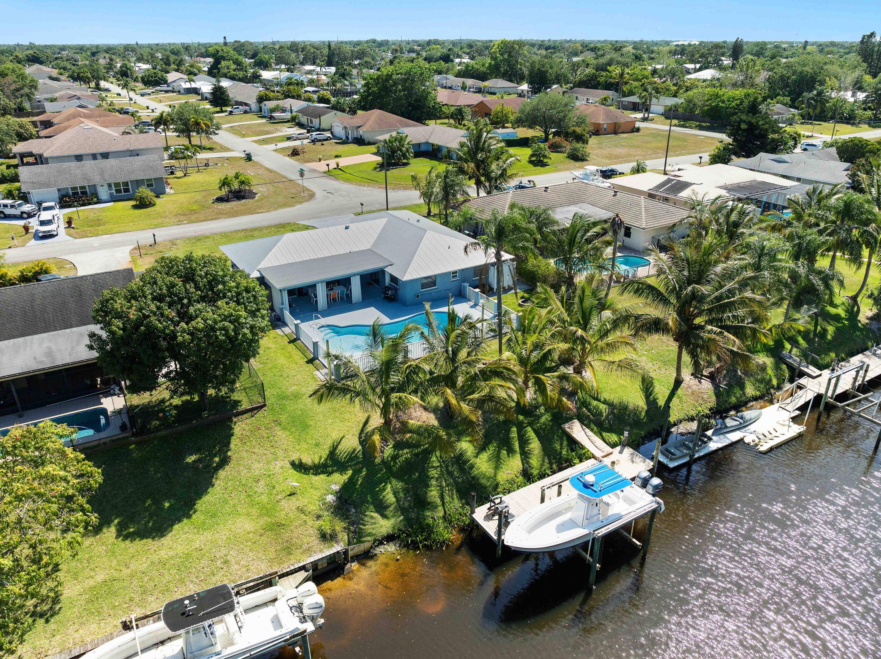 Welcome Home to this Beautiful Lovingly maintained CBS 3 2 2 Pool home with Ocean Access.
