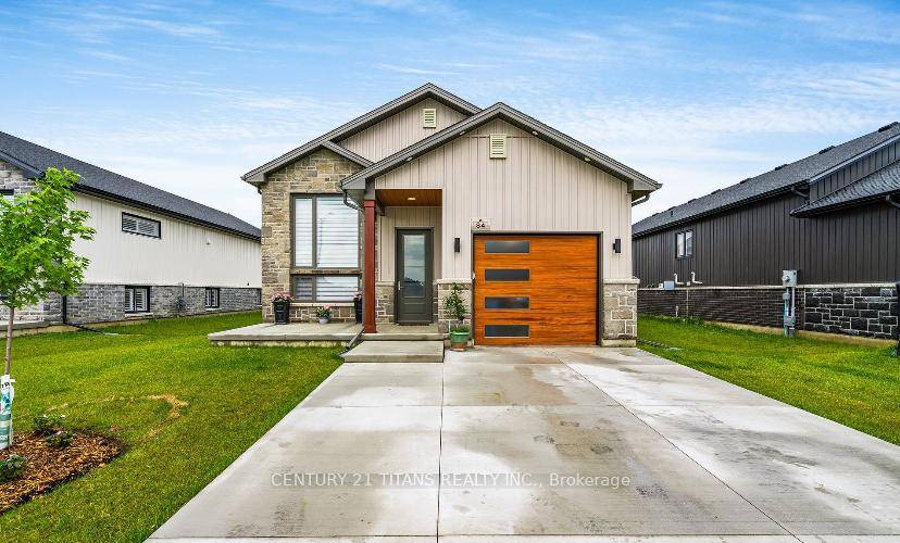 Welcome to this stunning 2 2 bedroom, 3 bathroom raised bungalow in one of Chatham's most sought after neighborhoods.