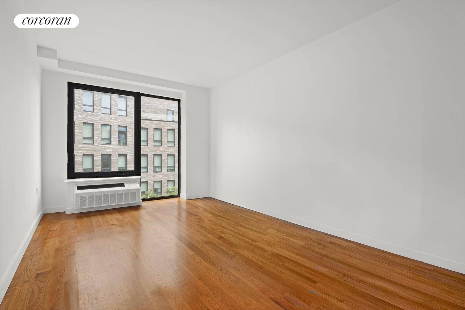 This extra spacious home features a large living space, plus floor to ceiling windows allowing for open views and great sunlight.