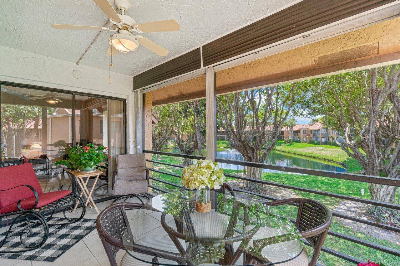 THIS 2 BEDROOM 2 BATH CONDO HAS BEAUTIFUL SERENE LAKE VIEWS FROM THE SCREENED LANAI FROM JUST ABOUT EVERY WINDOW !