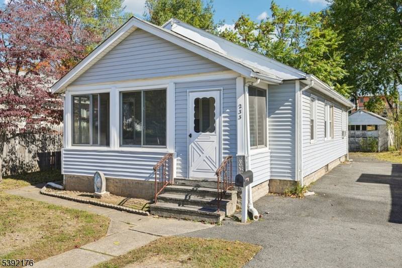 Adorable two bedroom ranch with front and side porches.