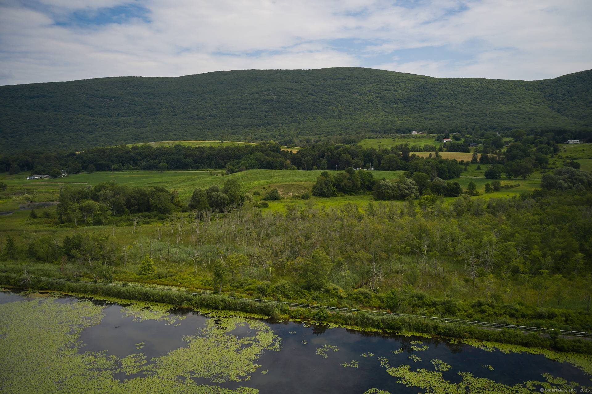 Boston Corners Farm. Estate parcel with incomparably beautiful panoramic views of the Upper Harlem Valley.