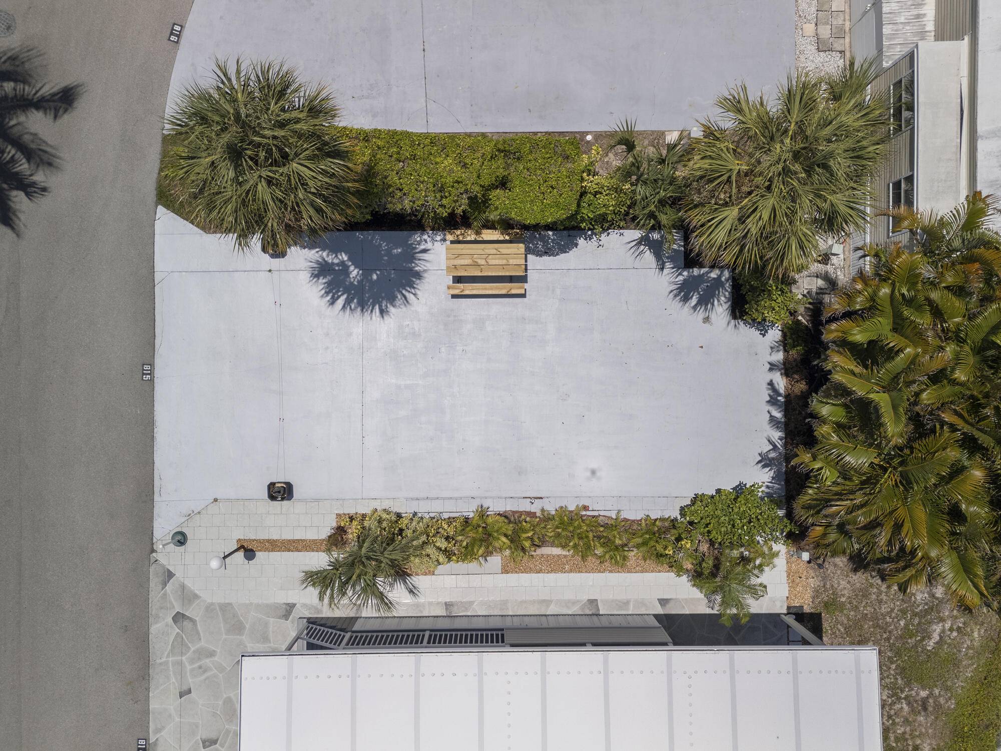 Own a piece of paradise with this lake view vacant lot in the sought after Juno Ocean Walk community perfect for RVs, travel trailers, or park models.