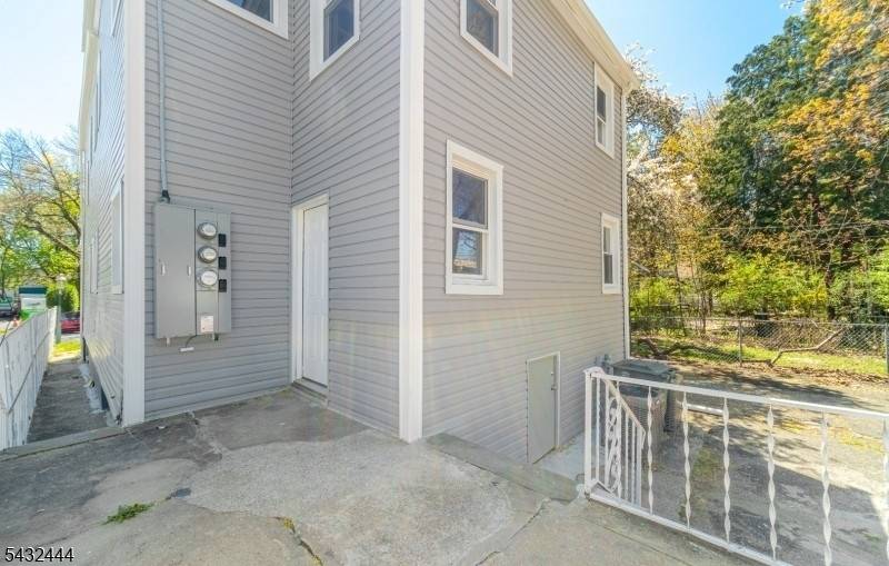 Beautifully renovated two family property featuring 2 units, each offering 2 spacious bedrooms and 2 full bathrooms.