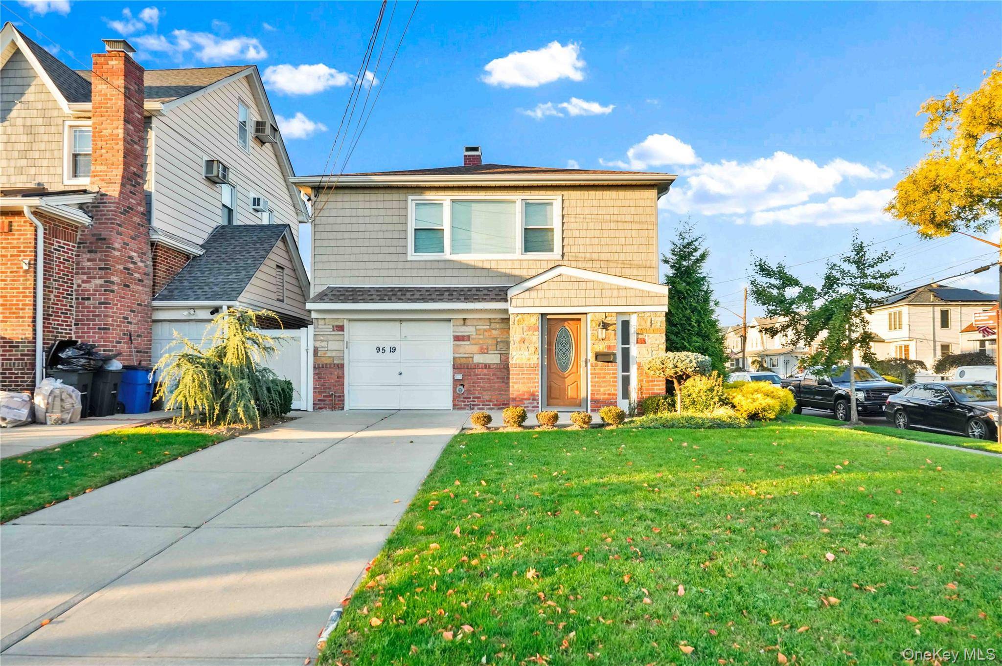 Welcome to 95 19 160th Ave, a spacious corner lot two family home on a quiet block that perfectly blends comfort, flexibility, and modern living.