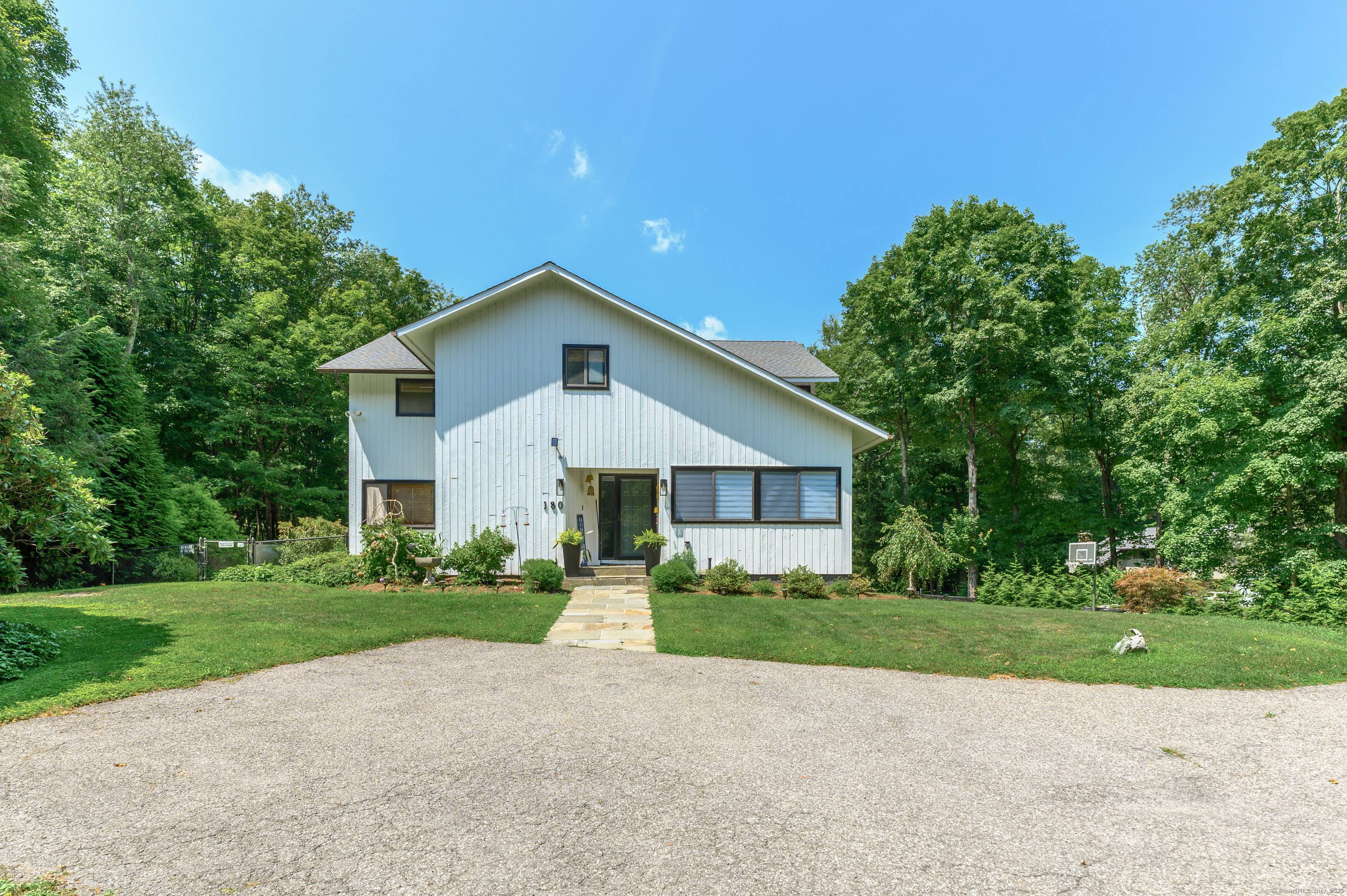 This recently renovated contemporary home has excellent living spaces both inside and out.