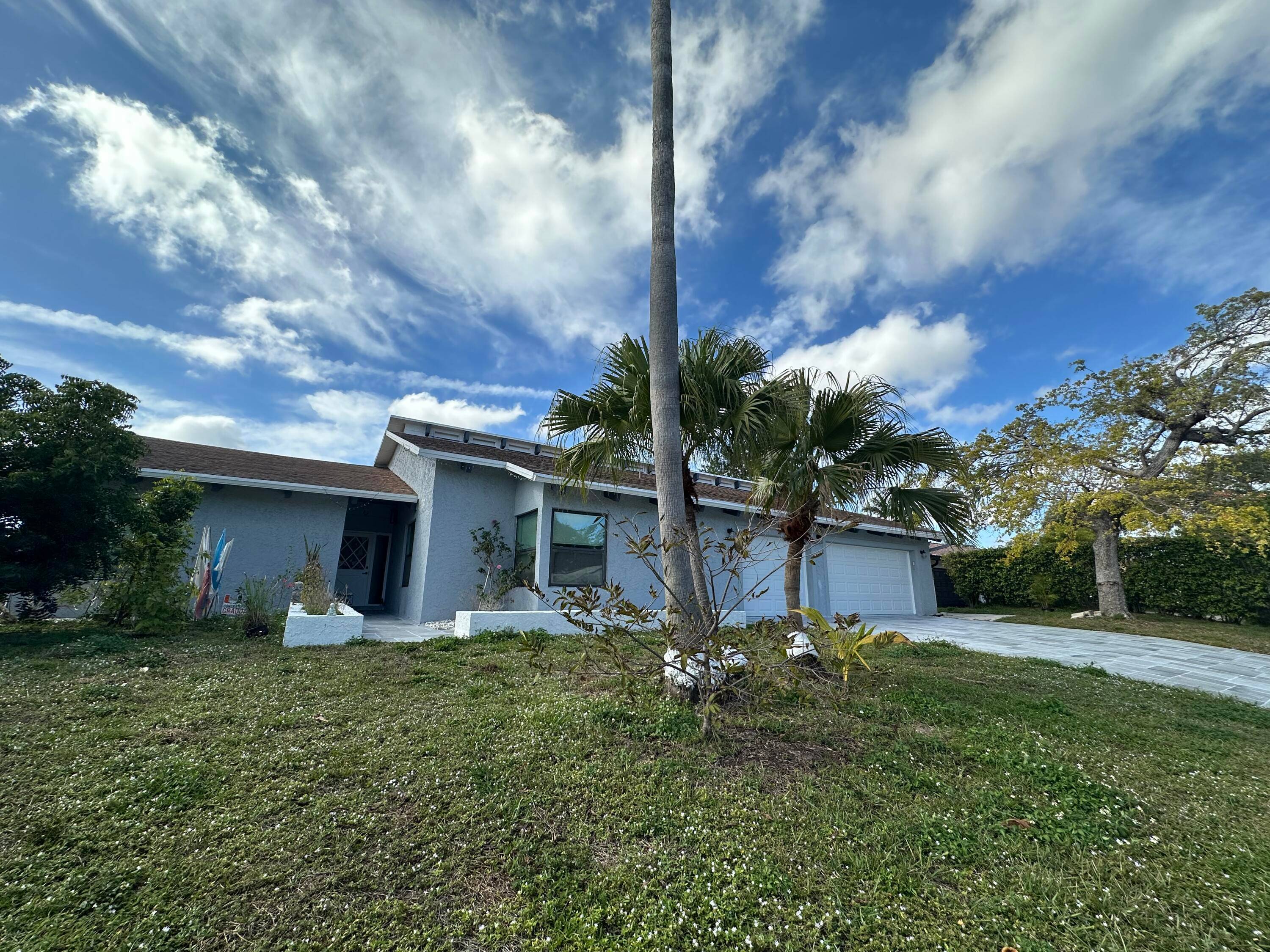 This beautiful modern home has lots of upgrades.