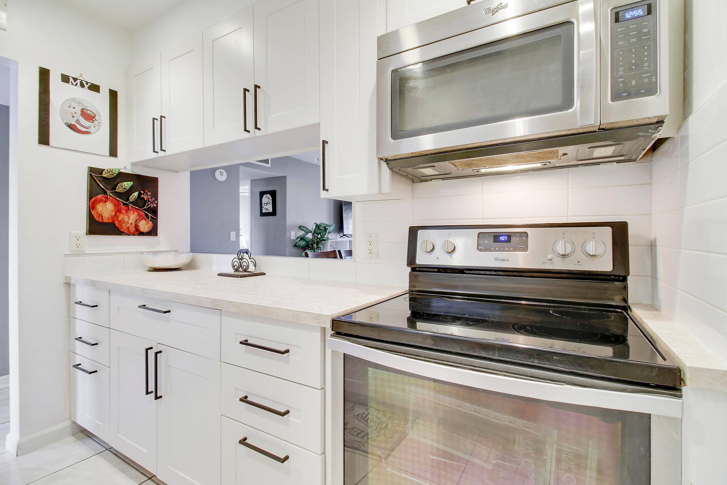 Immaculately Upgraded 2nd Story 2 2 Condo nestled away in the quiet ACTIVE ADULT Community of Greenway Village South.