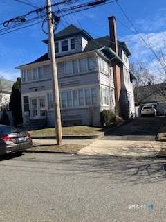 Good two family house in average condition, with 11 rooms, 6 bedrooms, 3 full baths, full basement and a 2 car garage.