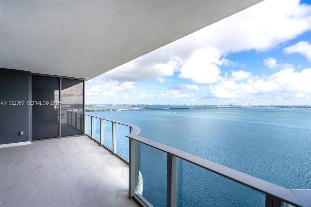 Spectacular bayfront, move in ready 3 bedroom den residence at Aria Reserve Miami brand new, elegantly upgraded, and perched on the 20th floor with direct, sweeping 180 Biscayne Bay views.