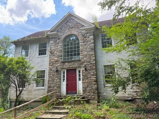 This well appointed Colonial offers four spacious bedrooms and is set on a secluded lot for added privacy.