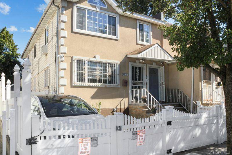 Welcome to 219 19 143rd Road, a well kept two family home offering space, versatility, and exceptional outdoor living.