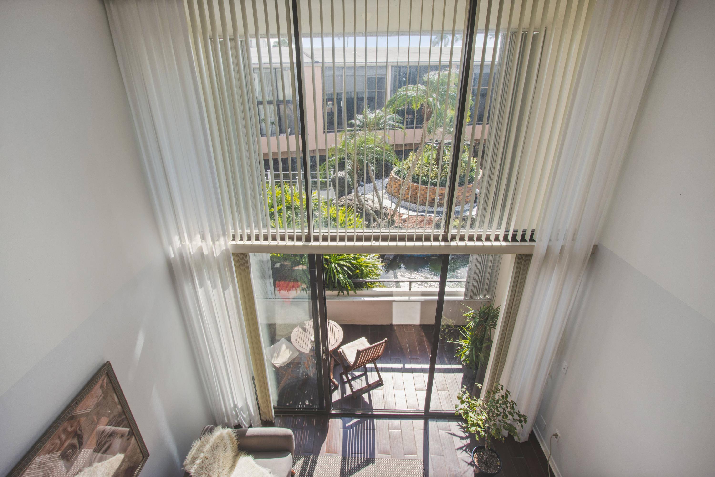 BEACH VILLA A rare opportunity to own this amazing loft townhouse, directly across from the beach.