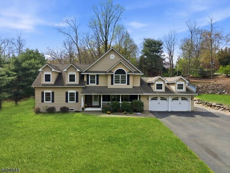 Welcome to this custom Colonial home loaded with amenities, located just moments from the Lake Valhalla Clubhouse.