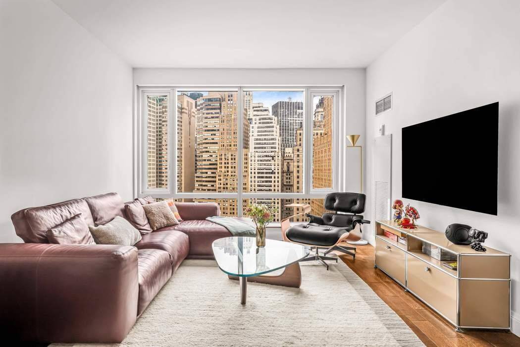 Experience elevated living in a spectacular one bedroom home perched on the 21st floor of The Visionaire a LEED Platinum Certified residential building.