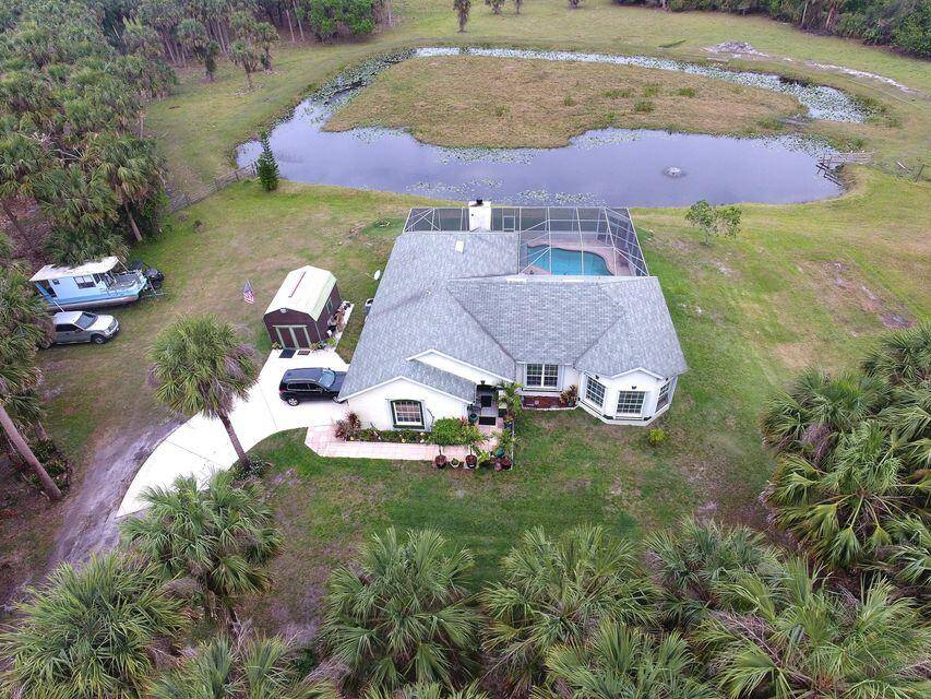 16 Acres in this Beautiful Ranchette off Carlton Road that has a long private road that leads you to a home and split into 2 parcels.