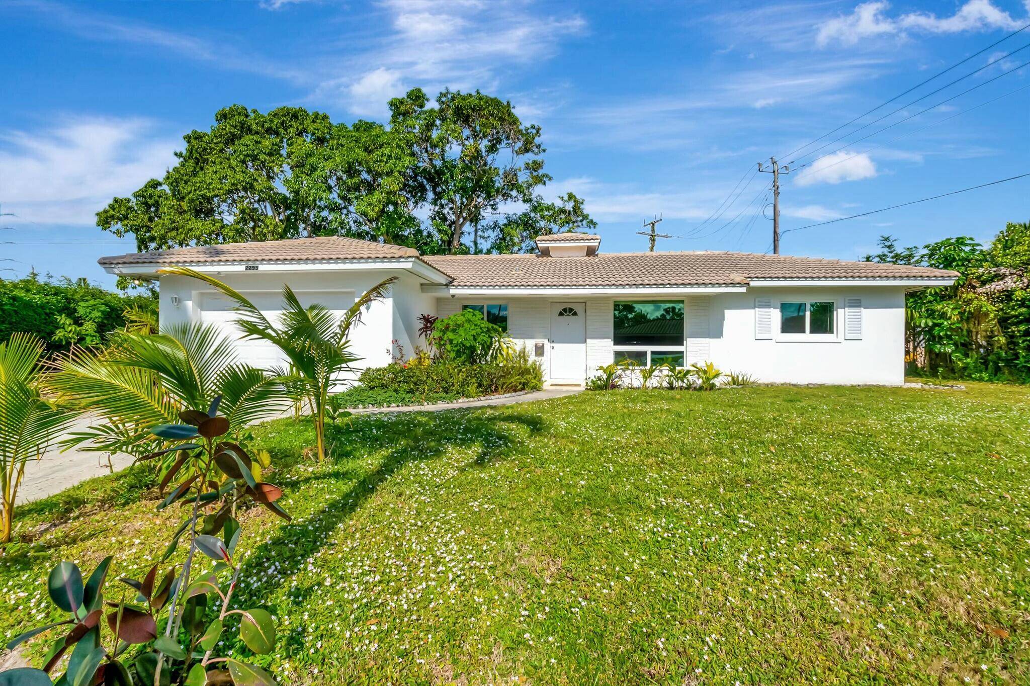 Nestled in the highly desired Paradise Palms community, lies a beautifully renovated home that exudes light, white and bright elegance.