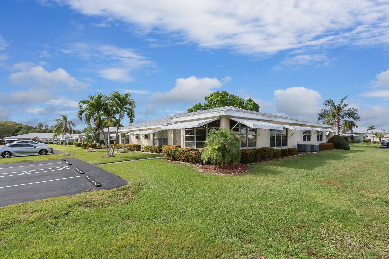 Welcome to this meticulously maintained 2 BR, 2 bath corner unit in the highly sought after gated community of High Point.