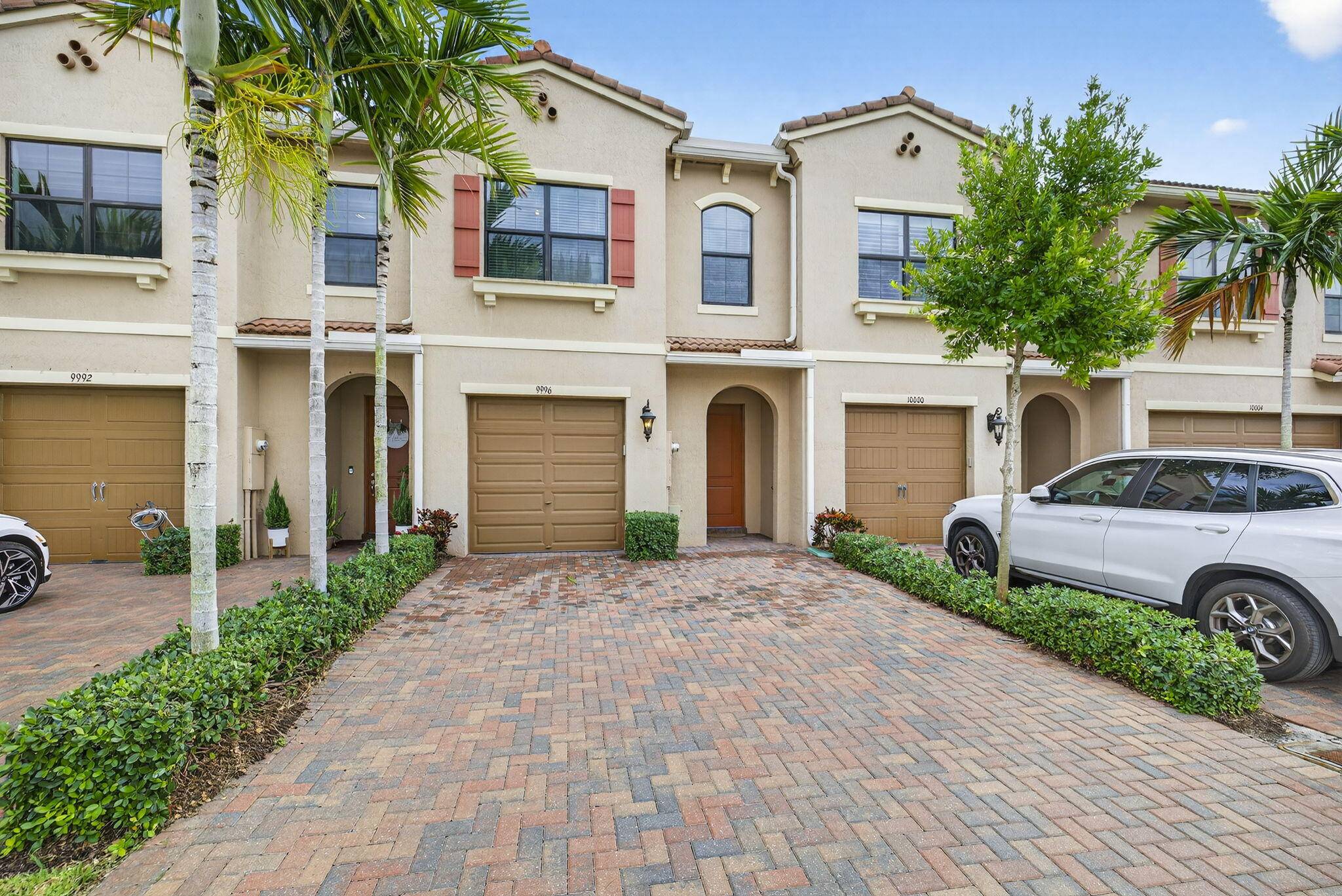 Welcome to this beautiful lake front, two story townhome at Enclave at Boca Dunes.