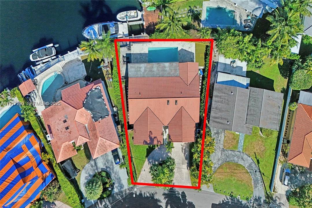 DRASTICALLY REDUCED ! ! FOR FAST CLOSING, Stunning 4 Bedroom a den, who could be used as 5th bedroom, 4 bathroom plus a bathroom cabana Waterfront Home in Gated Eastern ...