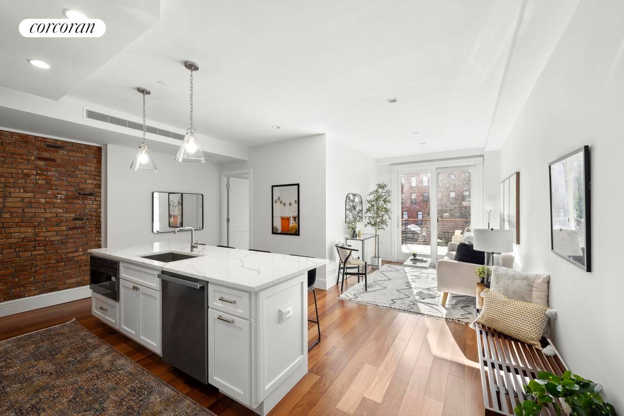 Only one flight up, PRIVATE OUTDOOR SPACE, brand new condo with pre war charm, low monthly costs, and a washer amp ; dryer !