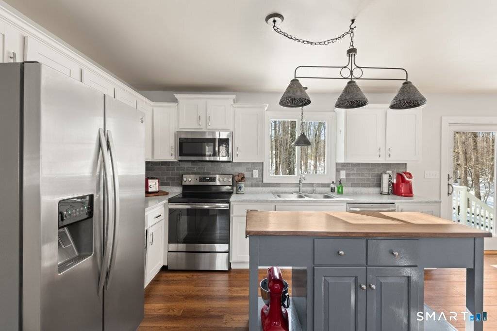 Set on highly coveted Brookwood Drive, this 4BR 2.