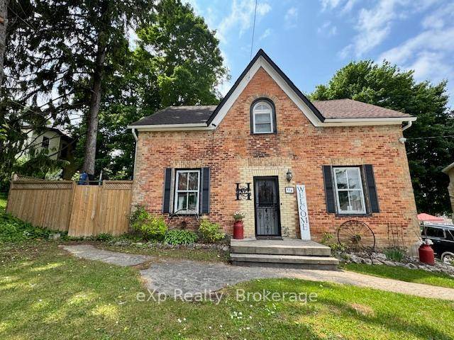 Spacious family starter home featuring brand new windows July 2025 in the living room, dining room, kitchen and playroom.